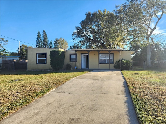 single story home with a front yard