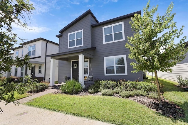 view of front of house featuring a front lawn