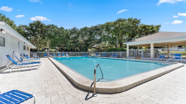 view of pool featuring a patio