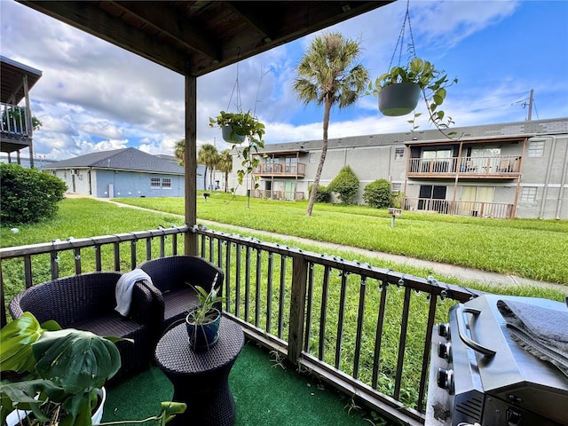 balcony featuring grilling area and a residential view