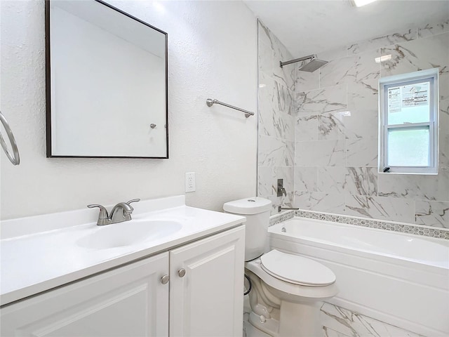 full bathroom featuring tiled shower / bath, vanity, and toilet