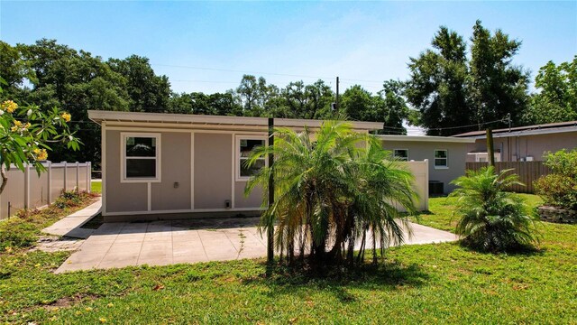 view of outdoor structure with a lawn