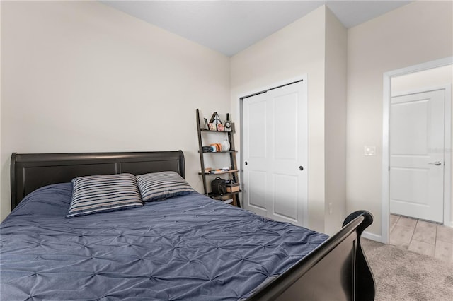 bedroom with a closet and wood-type flooring