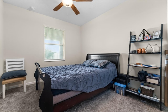 carpeted bedroom with vaulted ceiling and ceiling fan