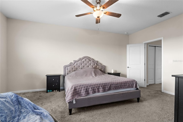 carpeted bedroom with ceiling fan