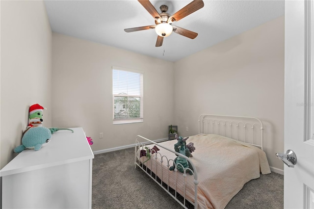 bedroom with ceiling fan and carpet floors