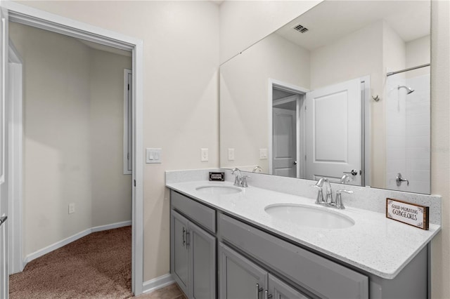 bathroom featuring vanity and walk in shower