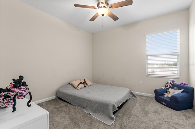 bedroom featuring ceiling fan and carpet floors