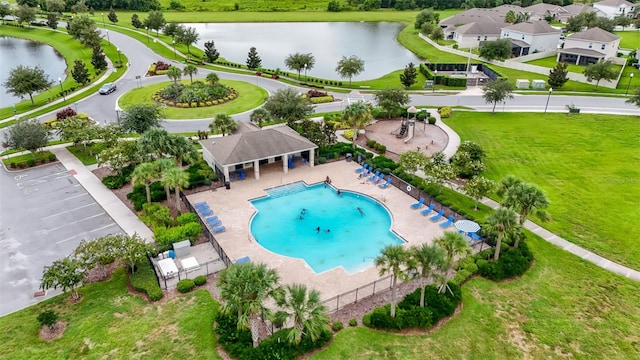 birds eye view of property featuring a water view