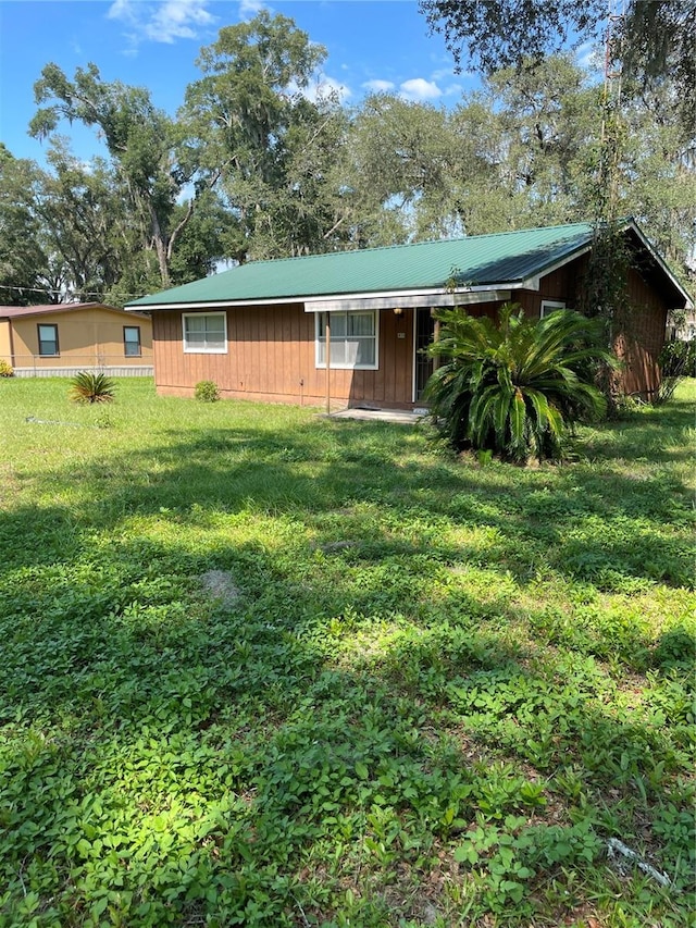 exterior space with a lawn