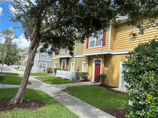 view of front of property featuring central AC