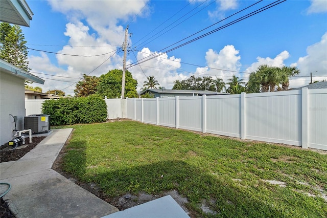 view of yard featuring central AC