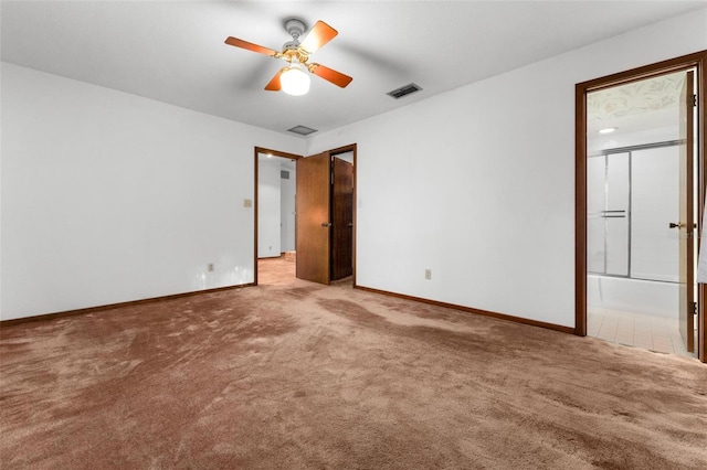 interior space featuring ceiling fan and carpet floors