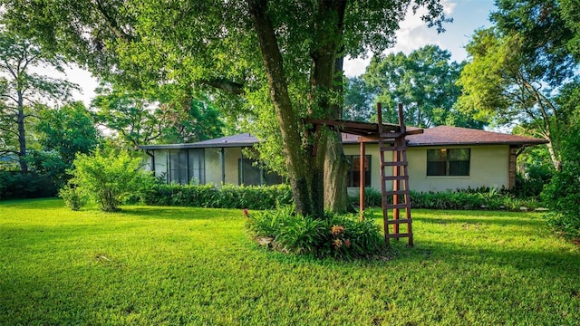 view of front of property with a front lawn