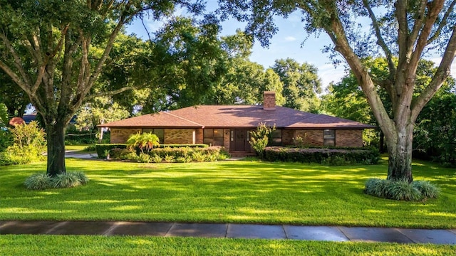 view of front of house with a front lawn