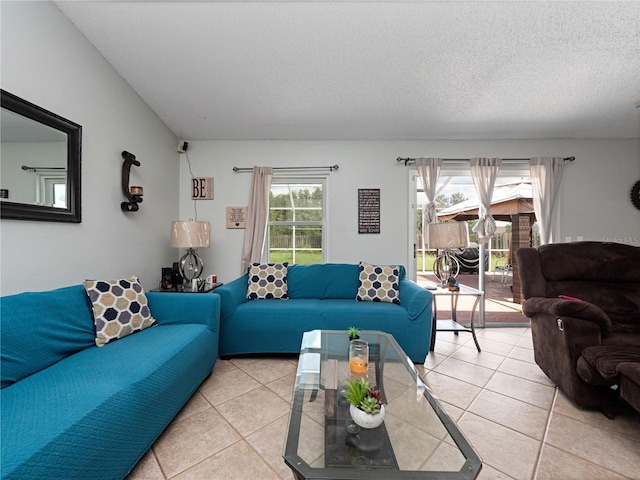 tiled living room with a textured ceiling