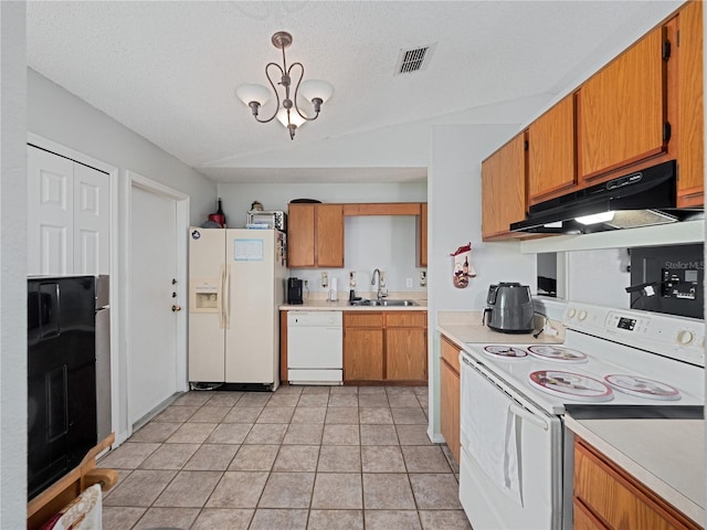 kitchen with white appliances, a notable chandelier, extractor fan, sink, and lofted ceiling