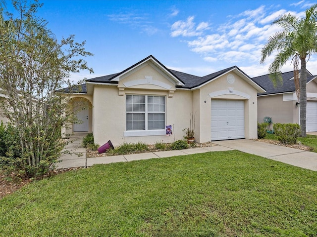 ranch-style house featuring a garage, a front yard, driveway, and stucco siding