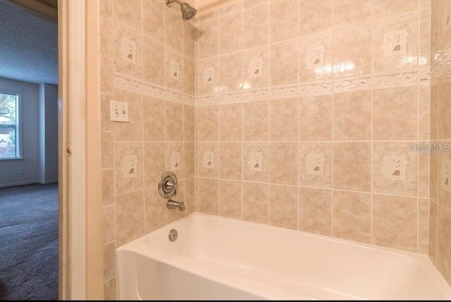 bathroom featuring shower / bath combination