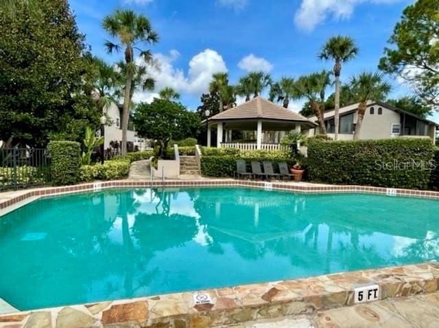 view of pool featuring a gazebo