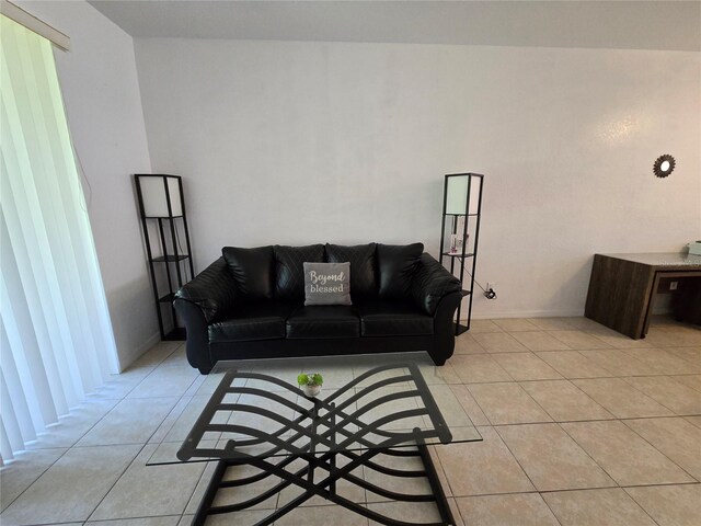 living room with light tile patterned floors