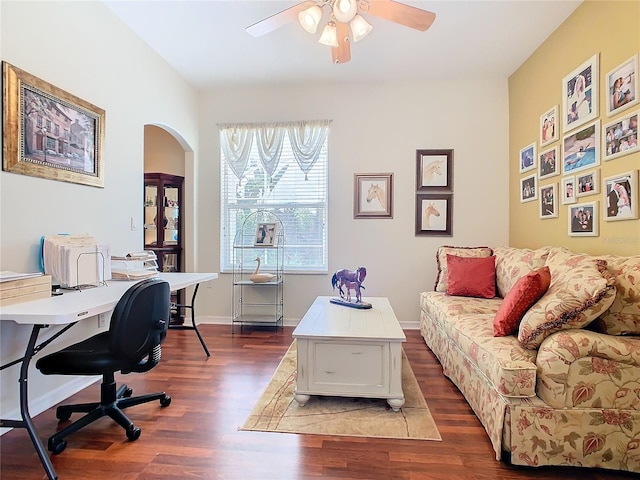 office featuring dark wood-type flooring and ceiling fan