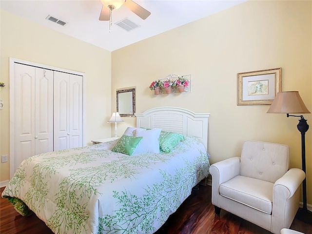 bedroom featuring a closet, ceiling fan, and dark hardwood / wood-style flooring