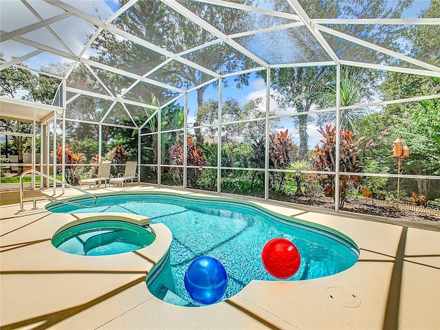 view of pool featuring a lanai and a patio area