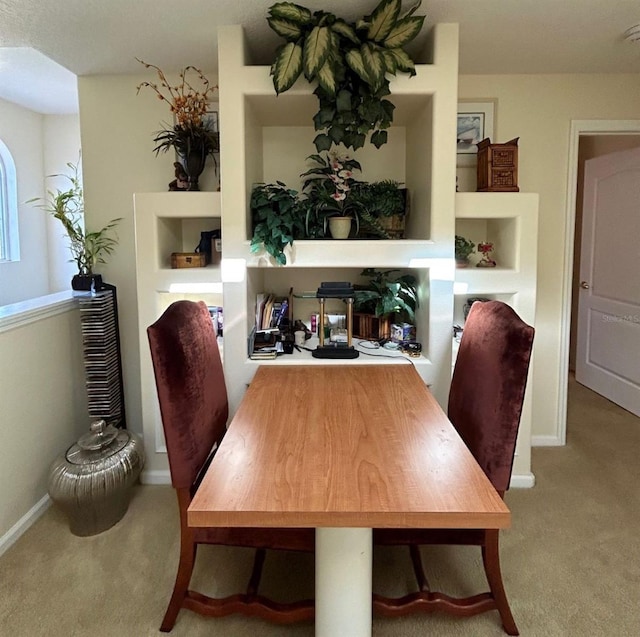 dining area with carpet flooring