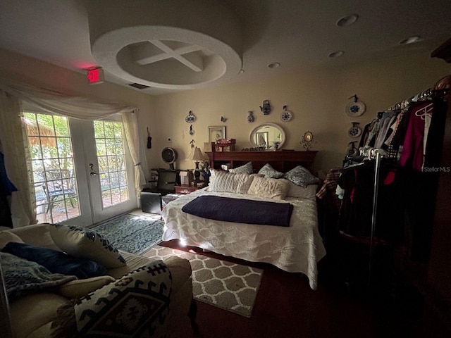 bedroom featuring access to exterior and french doors