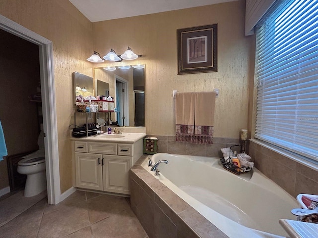 full bathroom with vanity, toilet, independent shower and bath, and tile patterned floors