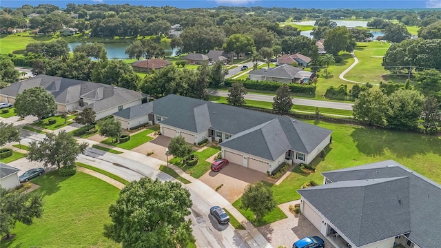 bird's eye view with a water view