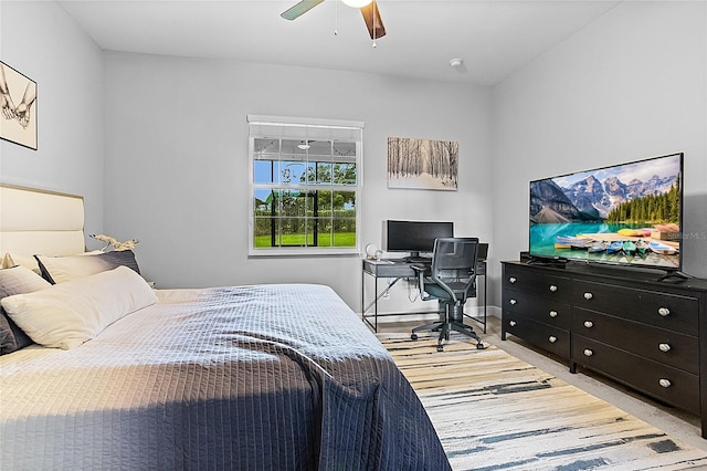 bedroom featuring light wood-type flooring and ceiling fan