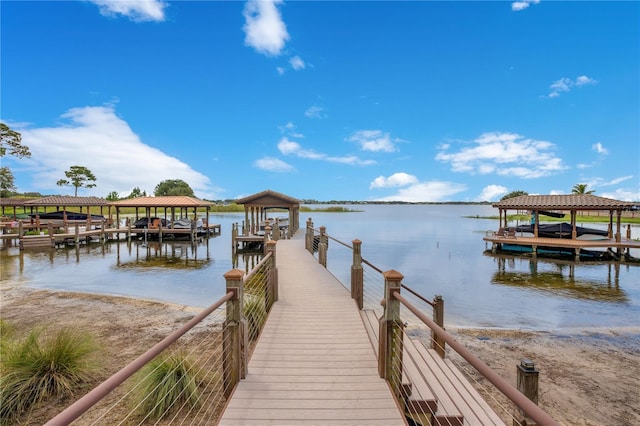 dock area featuring a water view and boat lift