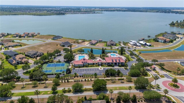 drone / aerial view with a water view