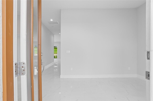 197 Valencia Ridge Dr, Auburndale, FL 33823 - entryway featuring marble finish floors, recessed lighting, and baseboards