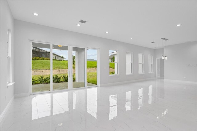 197 Valencia Ridge Dr, Auburndale, FL 33823 - empty room with marble tiled flooring, baseboards, and recessed lighting