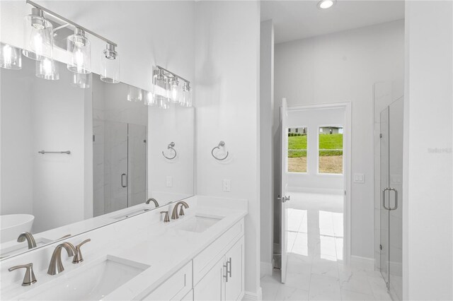 197 Valencia Ridge Dr, Auburndale, FL 33823 - full bath with marble look tile flooring, a shower stall, baseboards, recessed lighting, and double vanity