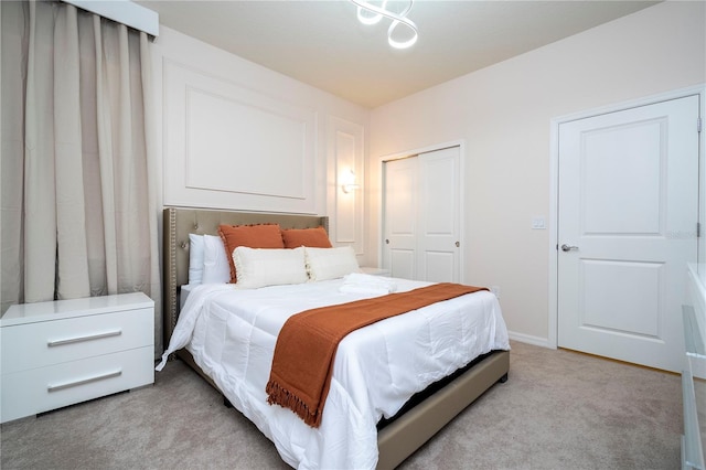 carpeted bedroom featuring a closet