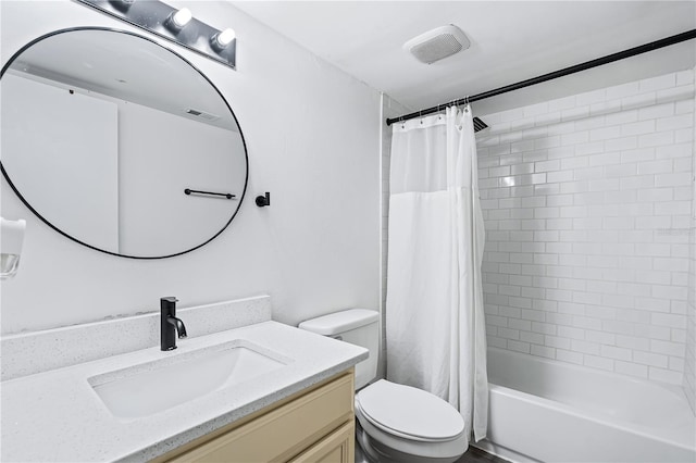 full bathroom with vanity, toilet, and shower / bath combo with shower curtain