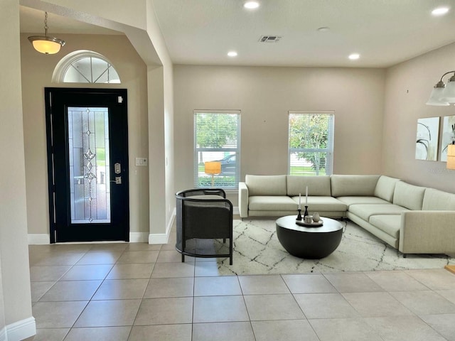 interior space with recessed lighting, visible vents, baseboards, and tile patterned floors