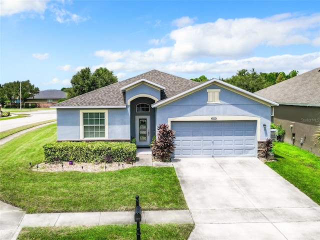 ranch-style house featuring a front yard, a garage, and central AC unit