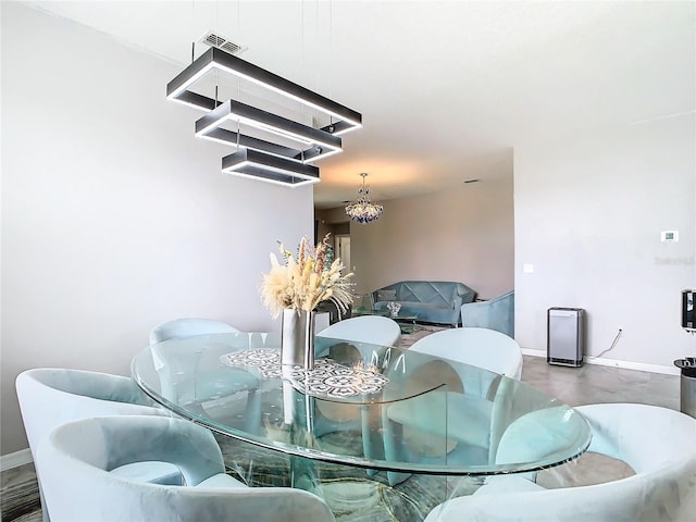 dining room with concrete floors