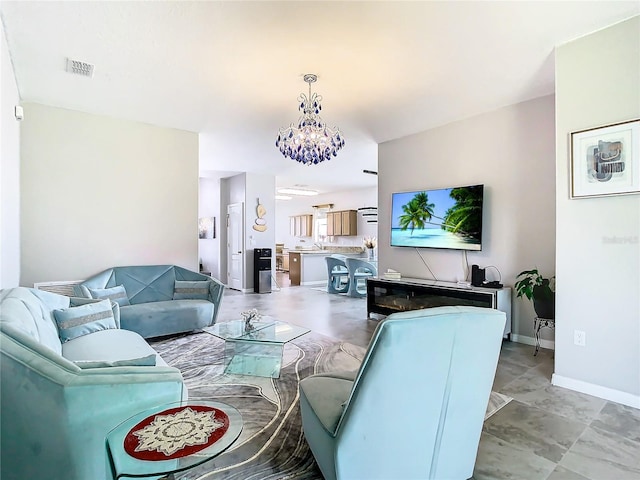 living room featuring a chandelier