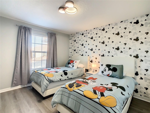 bedroom featuring wood-type flooring