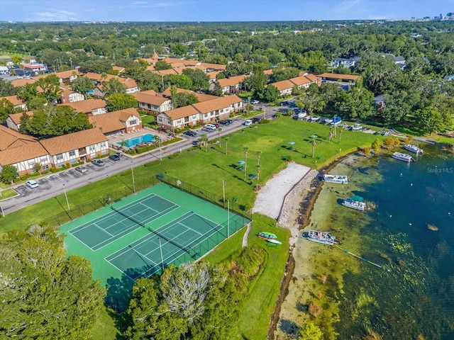 birds eye view of property featuring a water view