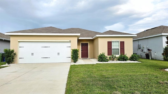 view of front facade with a front lawn and a garage