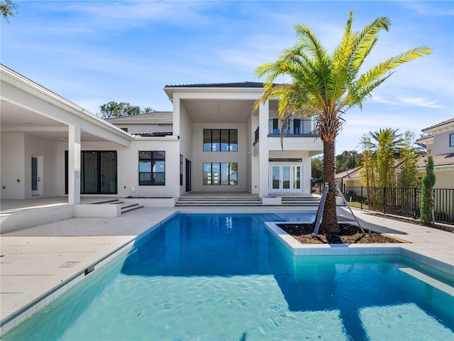 view of pool featuring a patio