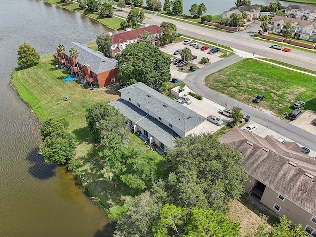 drone / aerial view with a water view