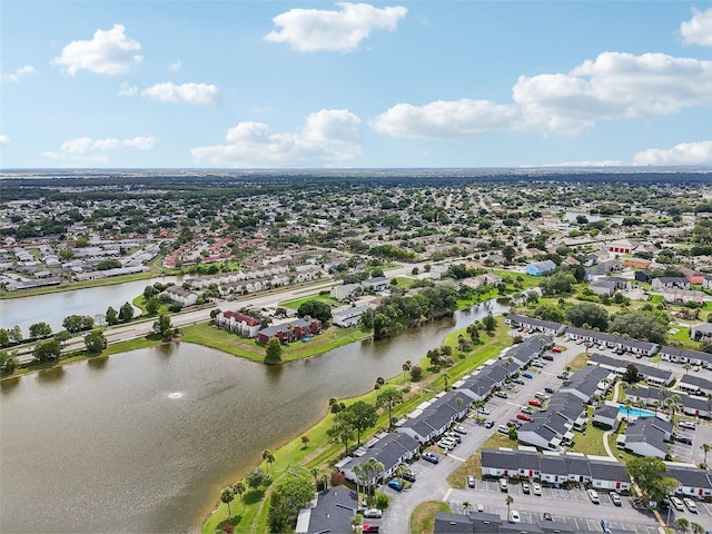 bird's eye view with a water view